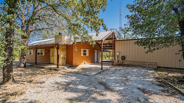 rear view of property with a patio