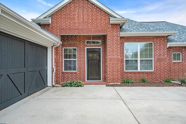 property entrance featuring a garage