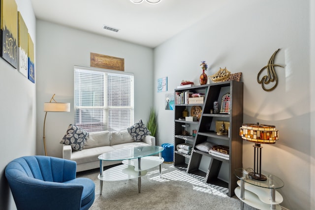 living area with carpet floors