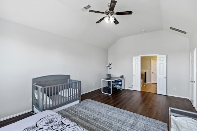 bedroom with lofted ceiling, ceiling fan, and dark hardwood / wood-style flooring