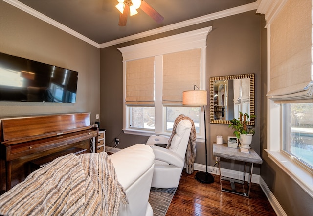 bedroom featuring ceiling fan, dark wood-type flooring, and crown molding