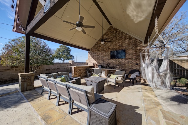 view of patio featuring ceiling fan and an outdoor hangout area