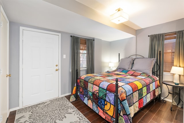 bedroom featuring dark hardwood / wood-style floors