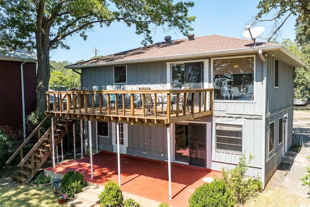 107 Briarwood Dr, Mabank, TX 75156 - back of property featuring stairs, a deck, a patio area, and roof with shingles