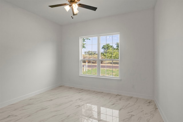 empty room featuring ceiling fan