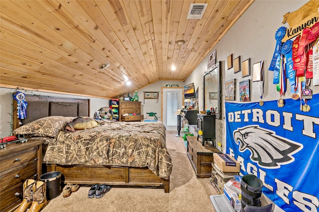 carpeted bedroom with wood ceiling and lofted ceiling