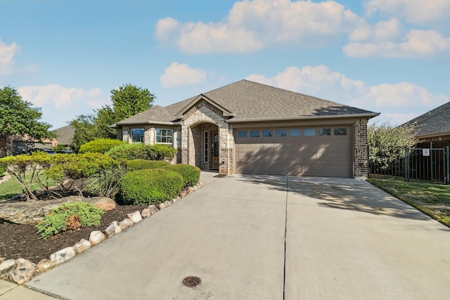 view of front of property featuring a garage