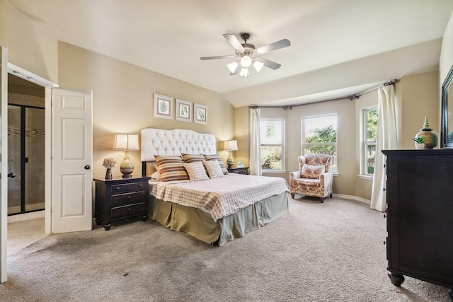 carpeted bedroom featuring ceiling fan and lofted ceiling