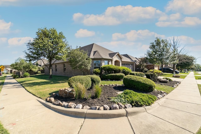 view of side of property featuring a yard