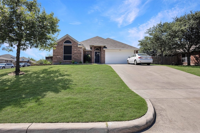 single story home featuring a front yard and a garage