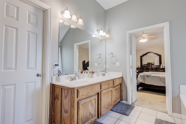 bathroom featuring vanity, ceiling fan, and tile patterned floors