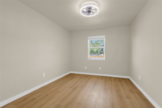 unfurnished room with light hardwood / wood-style floors