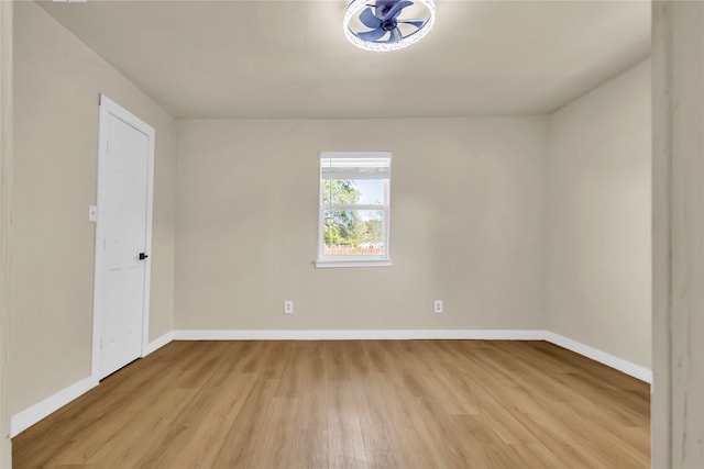 spare room featuring light hardwood / wood-style floors