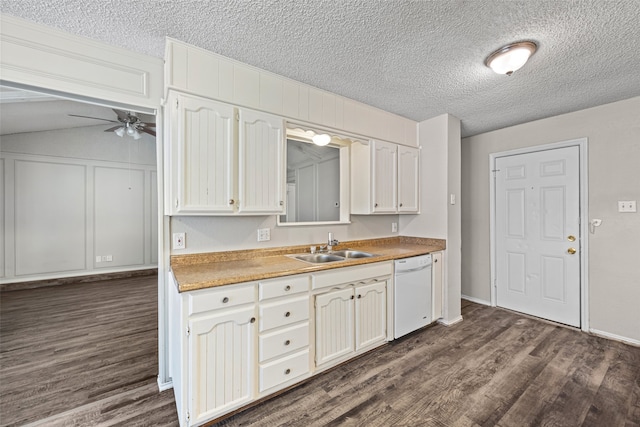 kitchen with white dishwasher, white cabinetry, dark hardwood / wood-style flooring, and ceiling fan