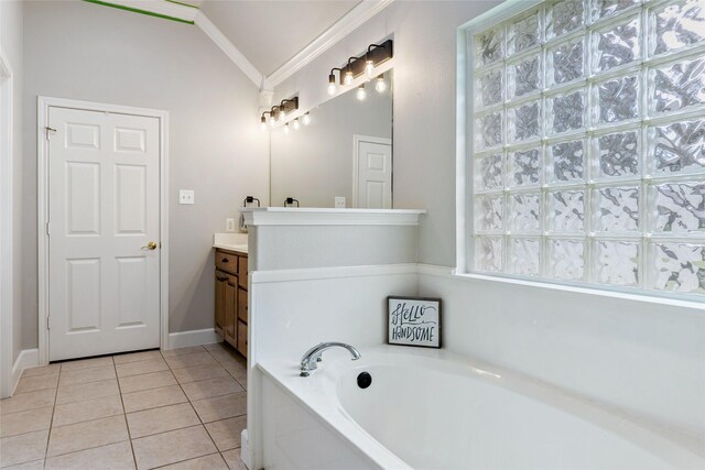 bathroom featuring vanity, lofted ceiling, ornamental molding, a relaxing tiled tub, and tile patterned flooring