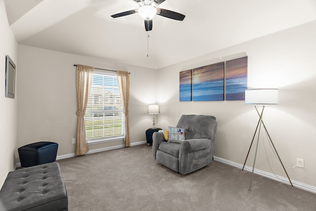 sitting room featuring ceiling fan and carpet flooring