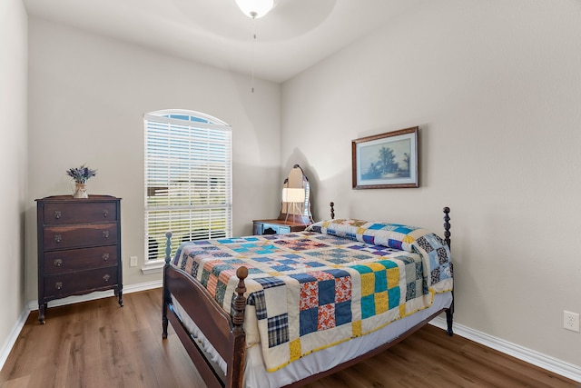 bedroom featuring ceiling fan and wood-type flooring