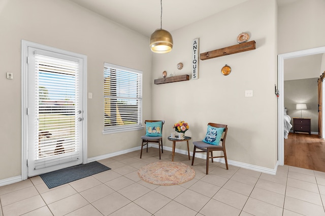 living area with light tile patterned floors