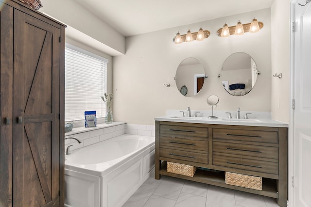 bathroom with vanity and a tub to relax in