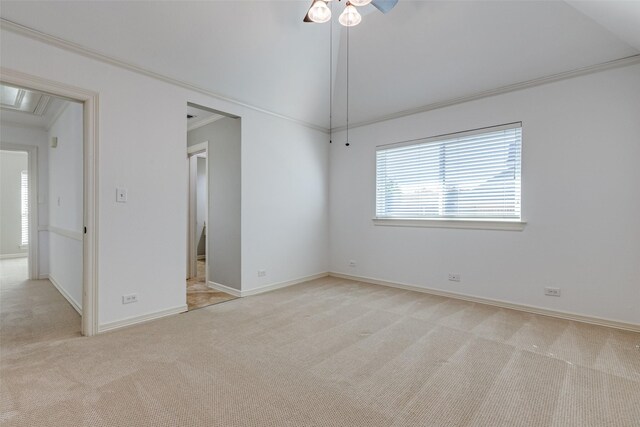 carpeted spare room with high vaulted ceiling and ceiling fan