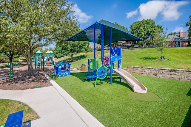 view of play area with a yard