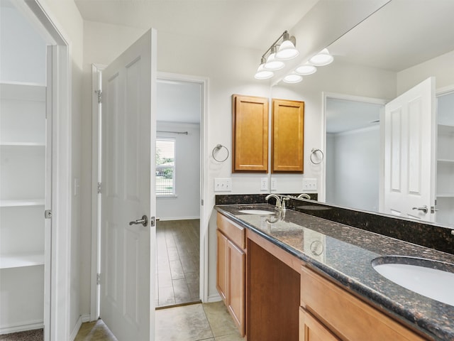 bathroom featuring hardwood / wood-style flooring and vanity