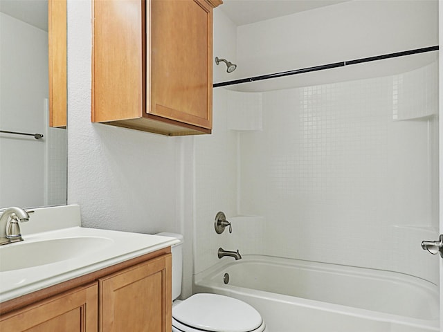 full bathroom with vanity, toilet, and  shower combination