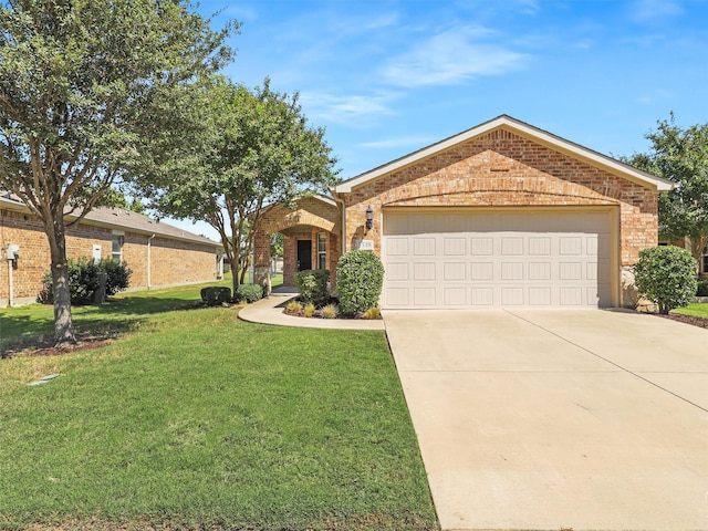 ranch-style home with a front lawn and a garage