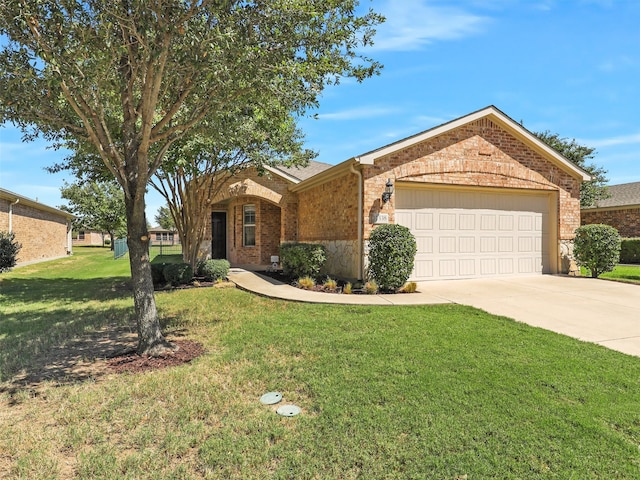 single story home with a front yard and a garage