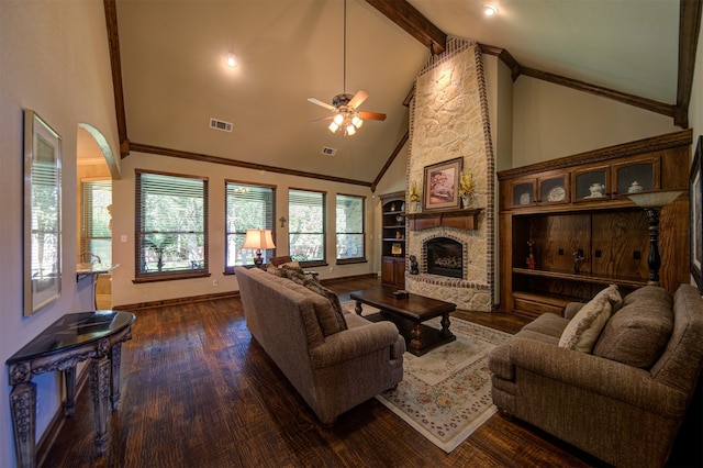 living room featuring a stone fireplace, dark hardwood / wood-style flooring, ceiling fan, and high vaulted ceiling