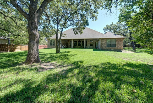 exterior space featuring a lawn