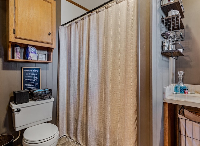 bathroom with walk in shower and toilet