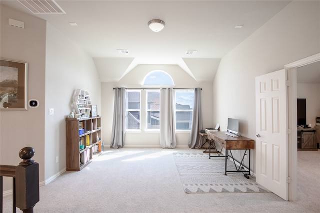 living area featuring vaulted ceiling and light colored carpet