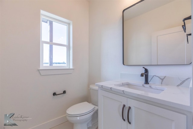 half bath with toilet and vanity