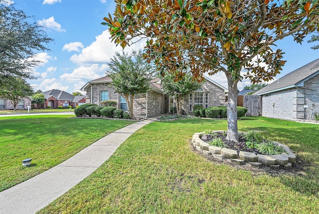 view of front facade with a front yard