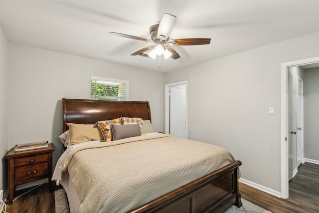 bedroom featuring dark hardwood / wood-style floors and ceiling fan