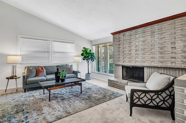 living room featuring a brick fireplace, carpet floors, and vaulted ceiling