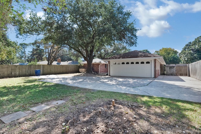 view of yard with a garage