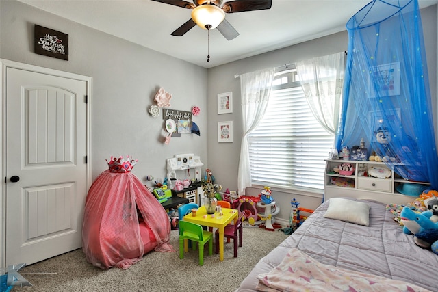 bedroom featuring ceiling fan and carpet flooring