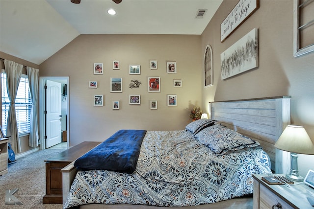 carpeted bedroom with lofted ceiling and ceiling fan