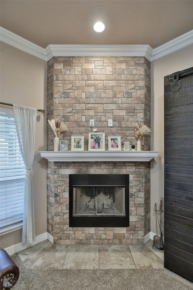 room details with a stone fireplace and crown molding