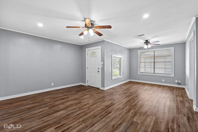 interior space featuring crown molding, dark hardwood / wood-style flooring, and ceiling fan