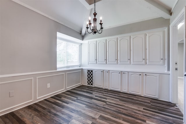 unfurnished dining area with a notable chandelier, beam ceiling, and dark hardwood / wood-style flooring