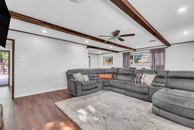 living room with beam ceiling, dark hardwood / wood-style floors, and ceiling fan