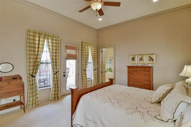 bedroom featuring light colored carpet, ceiling fan, and crown molding