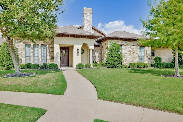 view of front of home with a front lawn