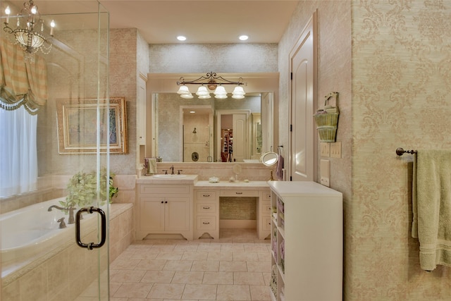 bathroom with tile patterned floors, plus walk in shower, vanity, and a notable chandelier