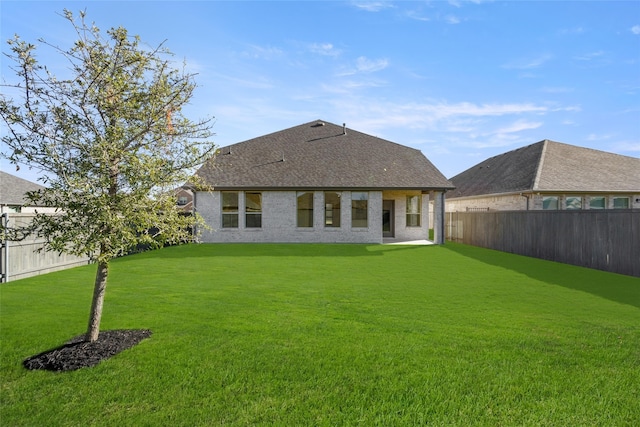 7513 Wild Mint Trl, Midlothian, TX 76084 - back of house featuring a shingled roof