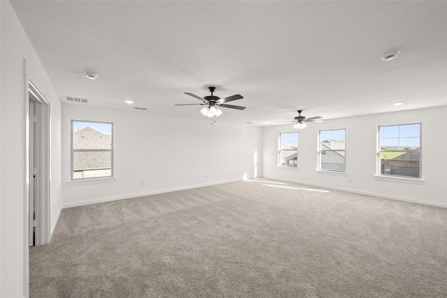 7513 Wild Mint Trl, Midlothian, TX 76084 - unfurnished room featuring light carpet, baseboards, healthy amount of natural light, and recessed lighting