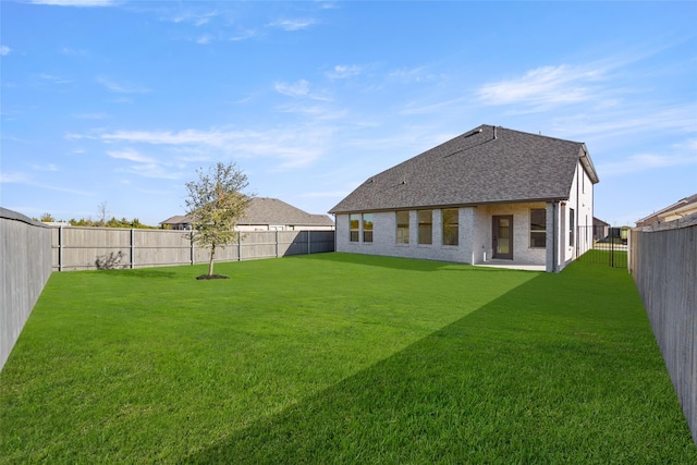 7513 Wild Mint Trl, Midlothian, TX 76084 - rear view of property featuring roof with shingles and brick siding